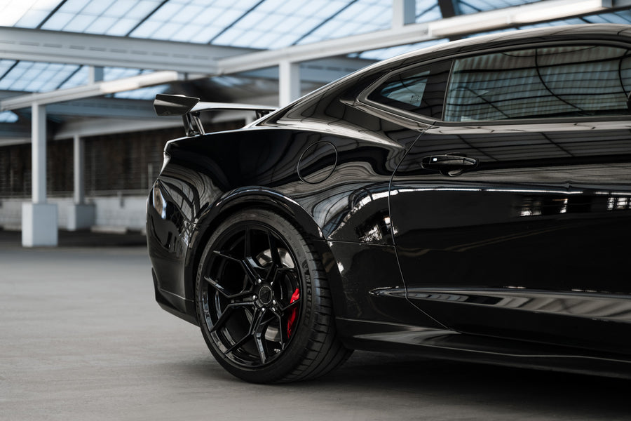 A 2018 Chevrolet Camaro ZL1 1LE on Blaque Diamond BD-F25 Gloss Black Wheels