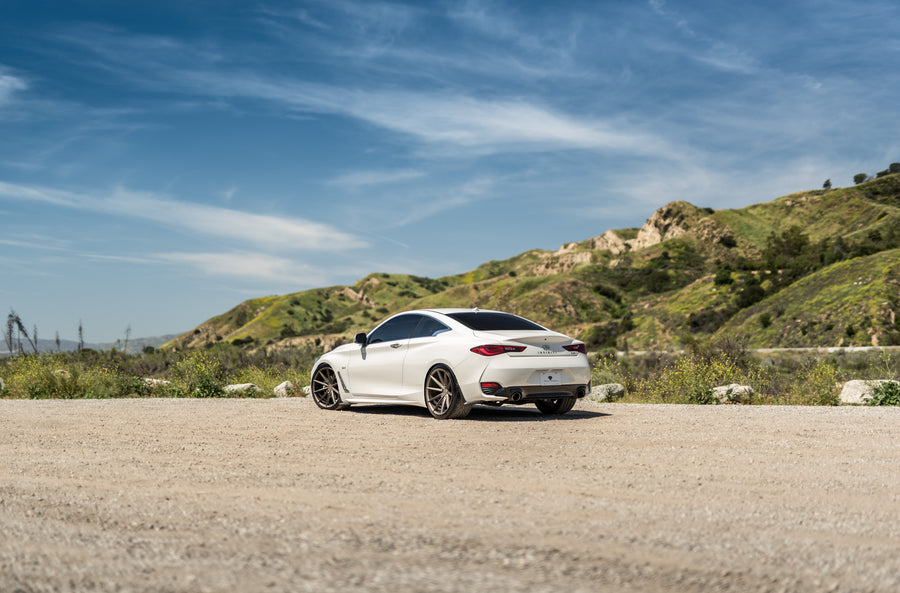 A 2017 Infiniti Q60 on Blaque Diamond BD-11 Antique Bronze Wheels