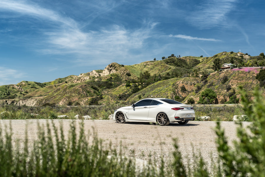 A 2017 Infiniti Q60 on Blaque Diamond BD-11 Antique Bronze Wheels