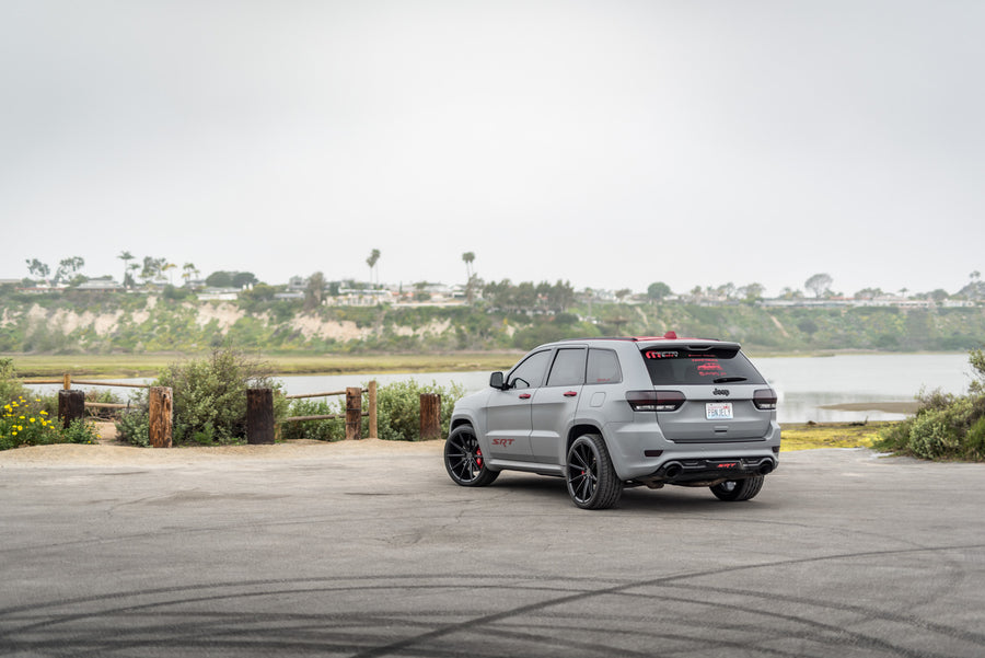 A 2014 Jeep Grand Cherokee SRT8 on Blaque Diamond BD11 Gloss Black Wheels