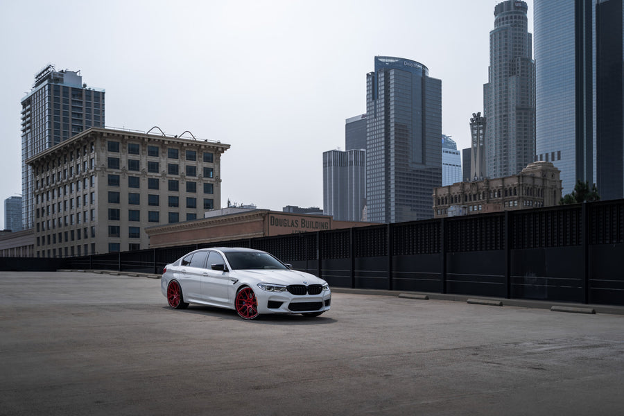 A 2020 BMW M5 Competition on Blaque Diamond BD-F18 Custom Brushed Lollipop Red Wheels