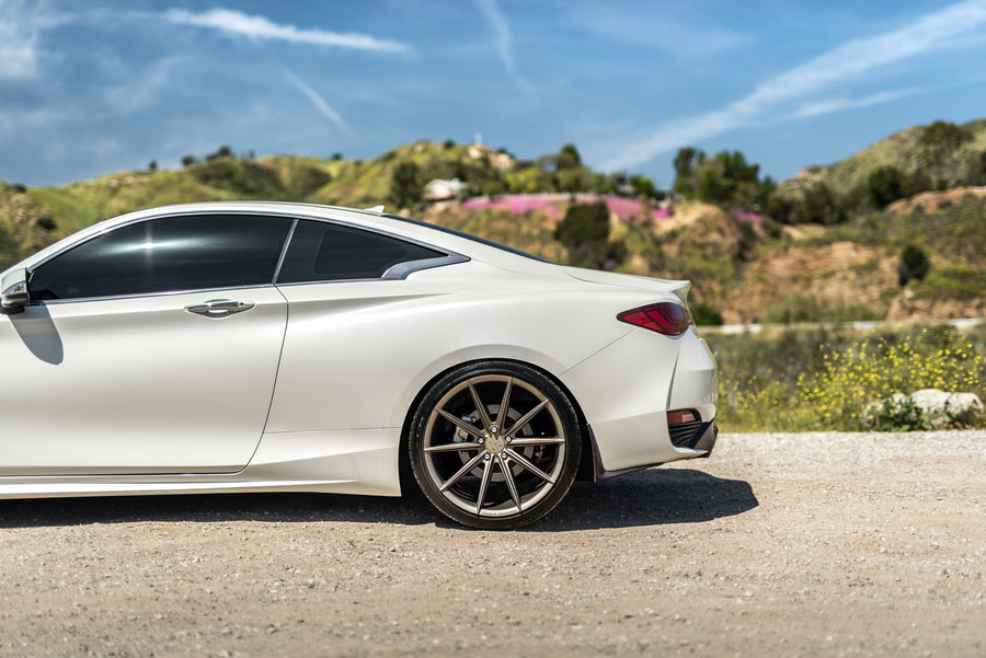 A 2017 Infiniti Q60 on Blaque Diamond BD-11 Antique Bronze Wheels