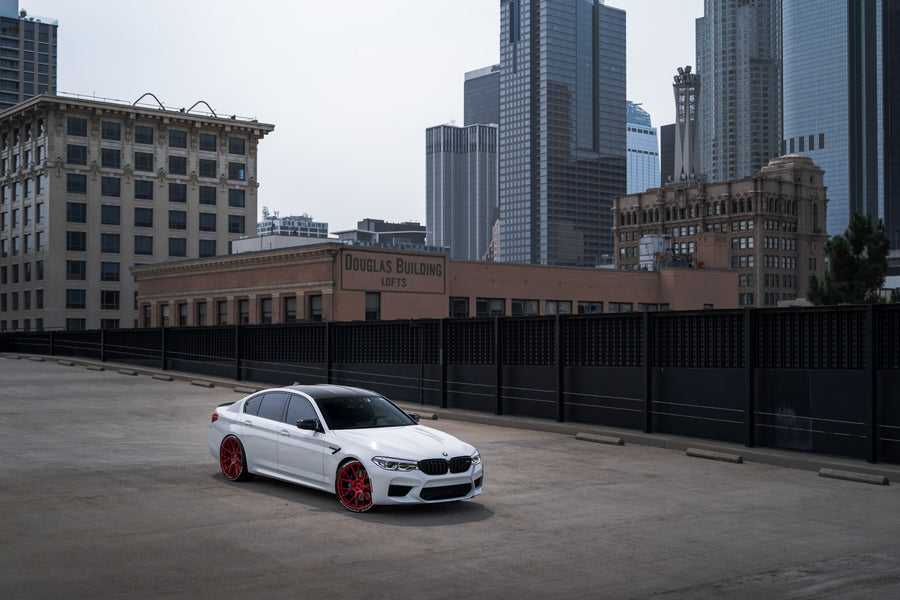 A 2020 BMW M5 Competition on Blaque Diamond BD-F18 Custom Brushed Lollipop Red Wheels