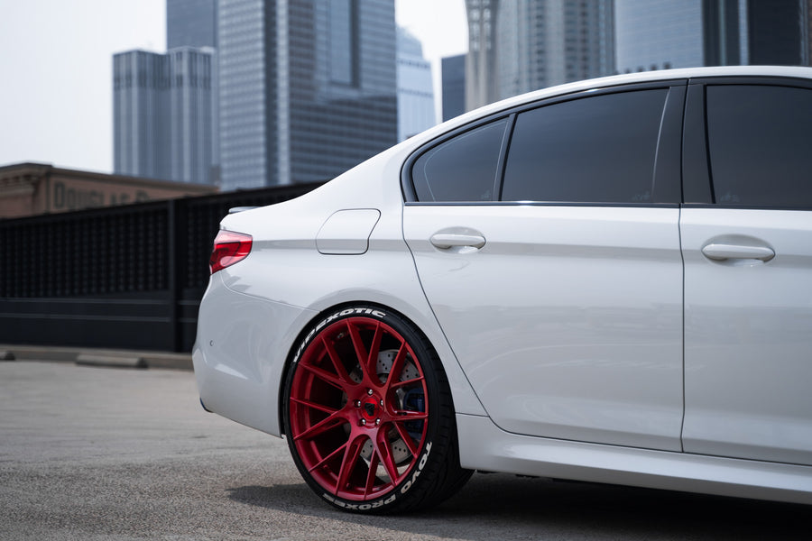 A 2020 BMW M5 Competition on Blaque Diamond BD-F18 Custom Brushed Lollipop Red Wheels