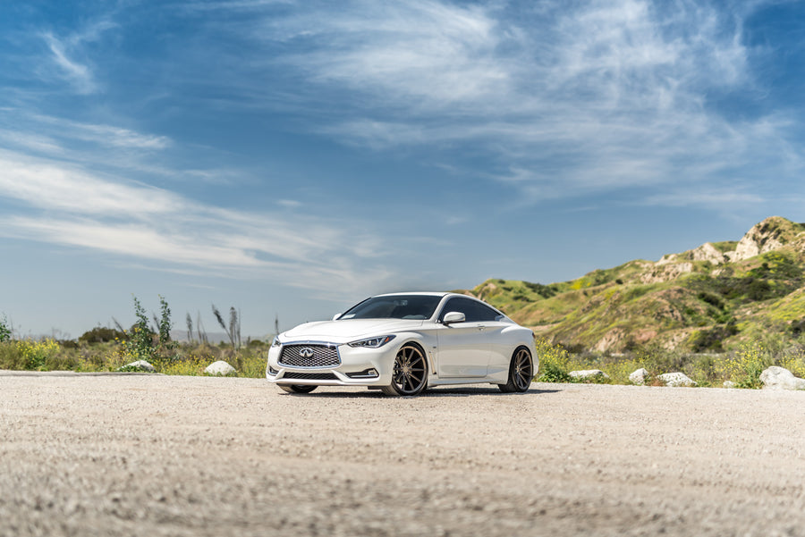 A 2017 Infiniti Q60 on Blaque Diamond BD-11 Antique Bronze Wheels