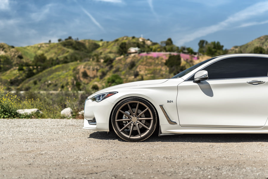 A 2017 Infiniti Q60 on Blaque Diamond BD-11 Antique Bronze Wheels