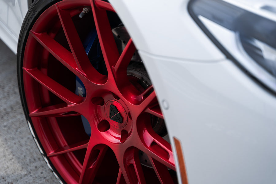 A 2020 BMW M5 Competition on Blaque Diamond BD-F18 Custom Brushed Lollipop Red Wheels