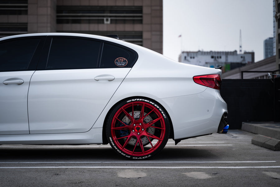 A 2020 BMW M5 Competition on Blaque Diamond BD-F18 Custom Brushed Lollipop Red Wheels