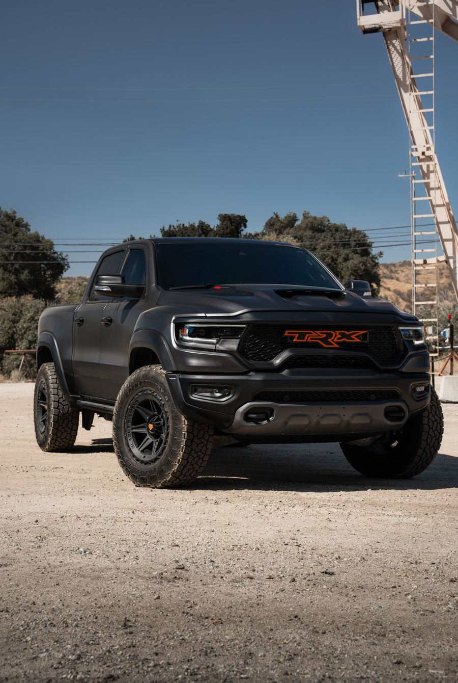 A 2022 Ram 1500 TRX on Blaque Diamond BD-O102 Textured Black Wheels