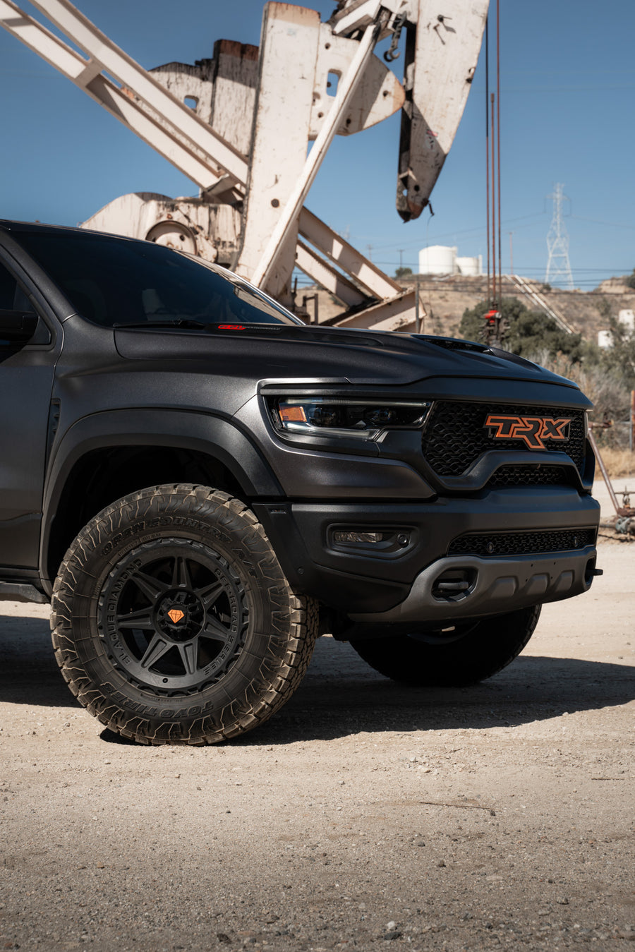 A 2022 Ram 1500 TRX on Blaque Diamond BD-O102 Textured Black Wheels
