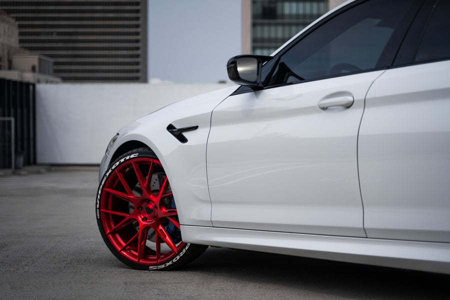 A 2020 BMW M5 Competition on Blaque Diamond BD-F18 Custom Brushed Lollipop Red Wheels