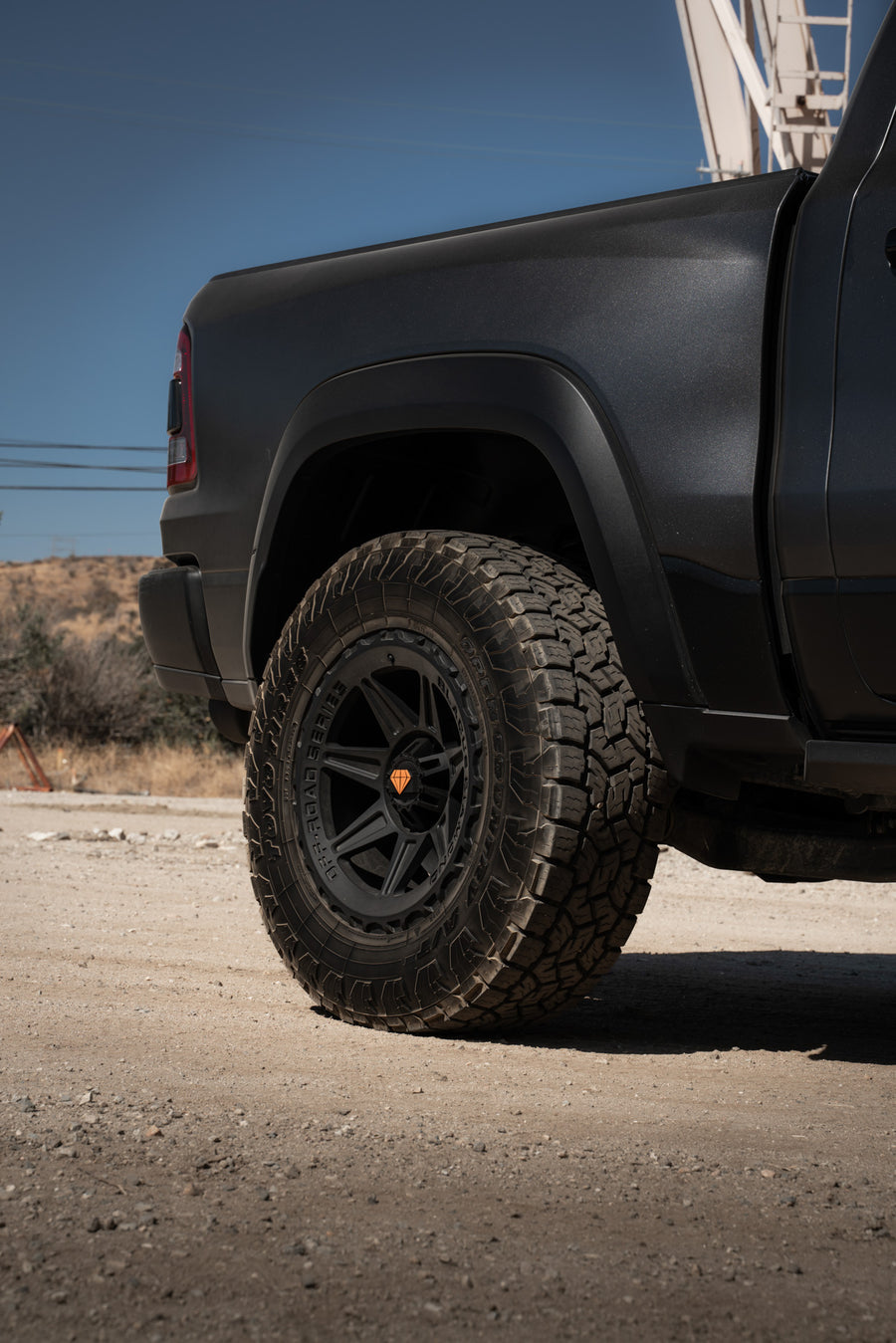 A 2022 Ram 1500 TRX on Blaque Diamond BD-O102 Textured Black Wheels