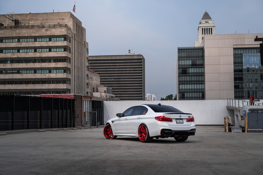 A 2020 BMW M5 Competition on Blaque Diamond BD-F18 Custom Brushed Lollipop Red Wheels