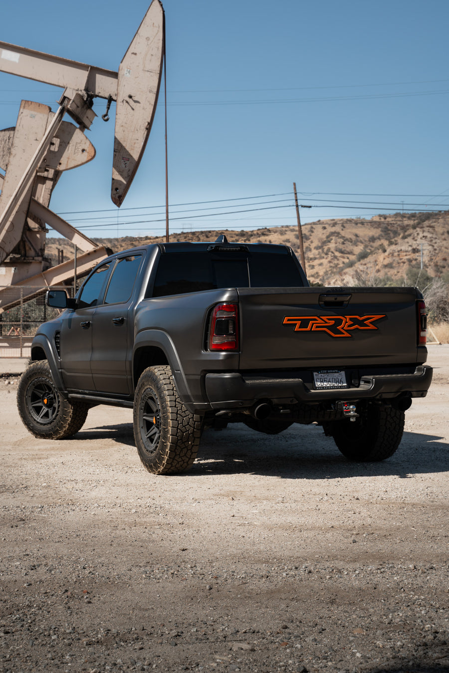 A 2022 Ram 1500 TRX on Blaque Diamond BD-O102 Textured Black Wheels