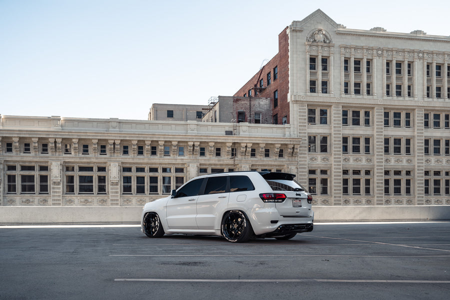 A 2014 Jeep Cherokee SRT8 on Blaque Diamond BD-F25 Gloss Black Wheels