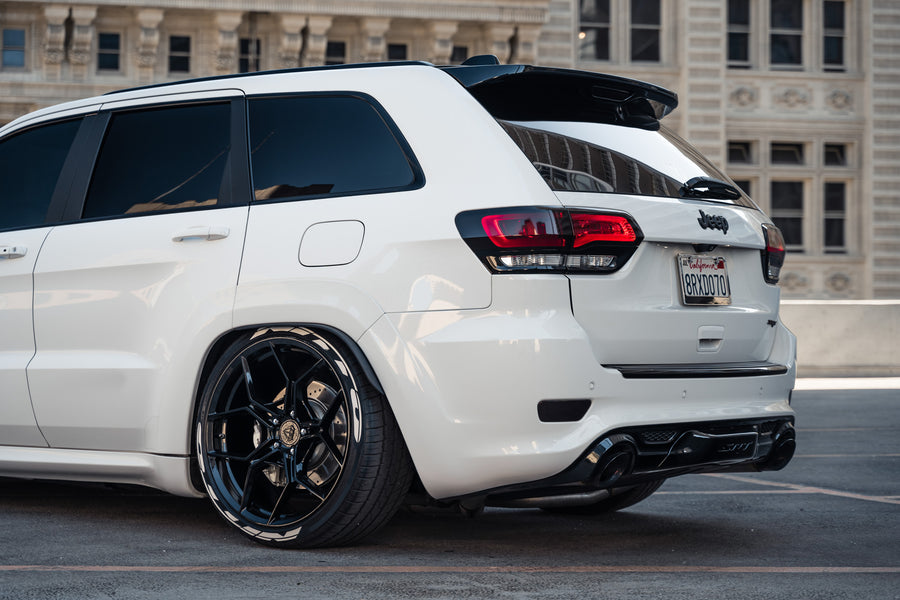 A 2014 Jeep Cherokee SRT8 on Blaque Diamond BD-F25 Gloss Black Wheels
