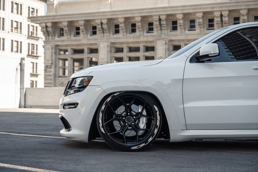 A 2014 Jeep Cherokee SRT8 on Blaque Diamond BD-F25 Gloss Black Wheels