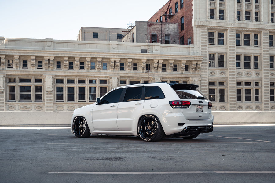 A 2014 Jeep Cherokee SRT8 on Blaque Diamond BD-F25 Gloss Black Wheels