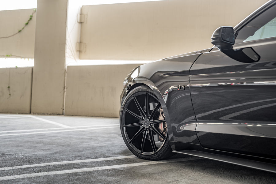 A 2015 Ford Mustang GT Foose Edition on Blaque Diamond BD-11 Gloss Black Staggered Wheels