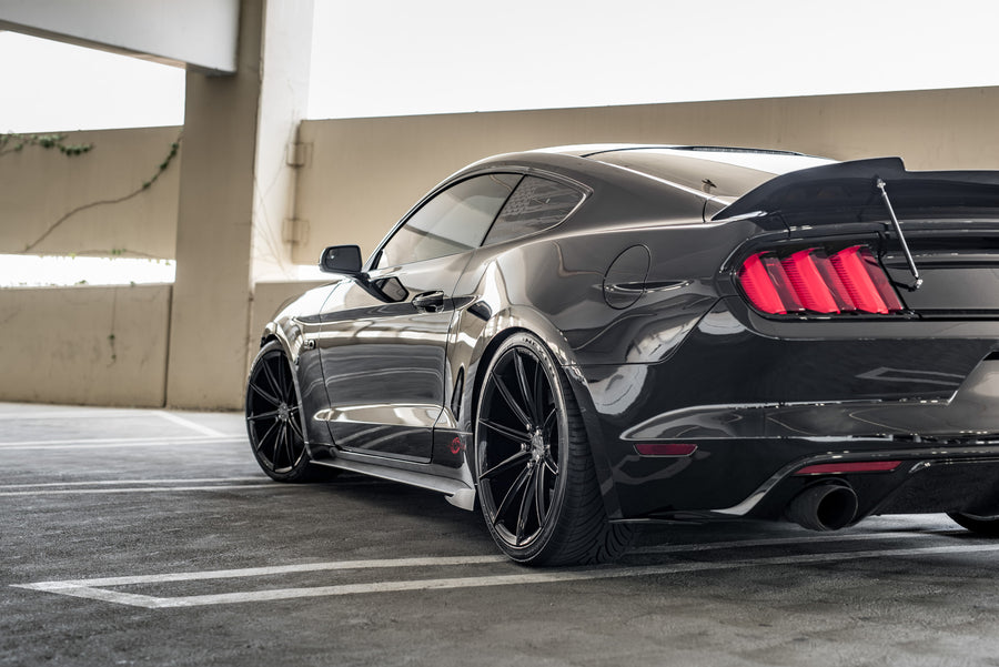A 2015 Ford Mustang GT Foose Edition on Blaque Diamond BD-11 Gloss Black Staggered Wheels