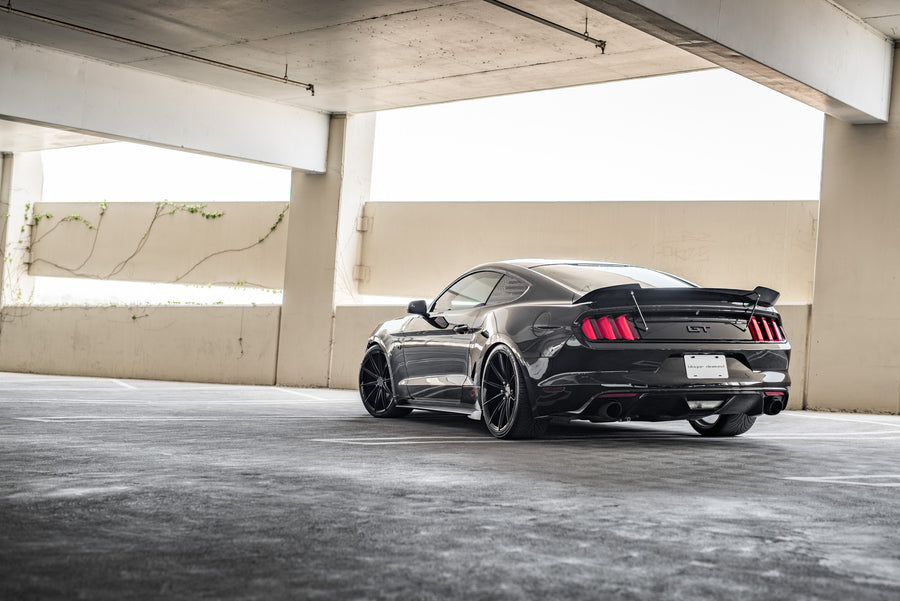 A 2015 Ford Mustang GT Foose Edition on Blaque Diamond BD-11 Gloss Black Staggered Wheels