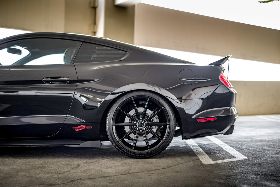 A 2015 Ford Mustang GT Foose Edition on Blaque Diamond BD-11 Gloss Black Staggered Wheels