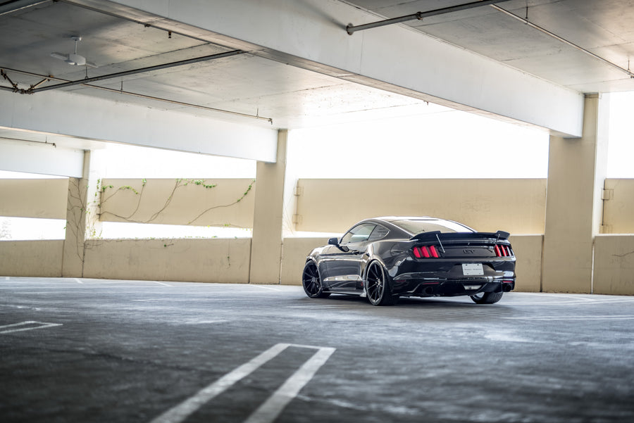 A 2015 Ford Mustang GT Foose Edition on Blaque Diamond BD-11 Gloss Black Staggered Wheels