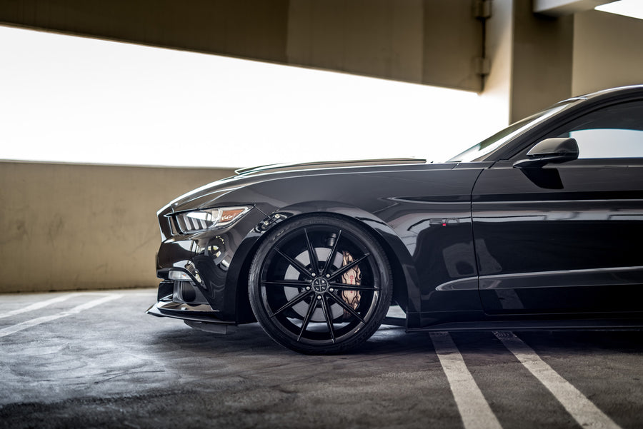 A 2015 Ford Mustang GT Foose Edition on Blaque Diamond BD-11 Gloss Black Staggered Wheels
