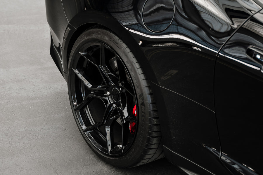 A 2018 Chevrolet Camaro ZL1 1LE on Blaque Diamond BD-F25 Gloss Black Wheels
