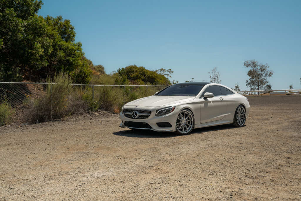 A 2015 Mercedes-Benz S550 Blaque Diamond BD-F23 Silver with Chrome Lip Wheels