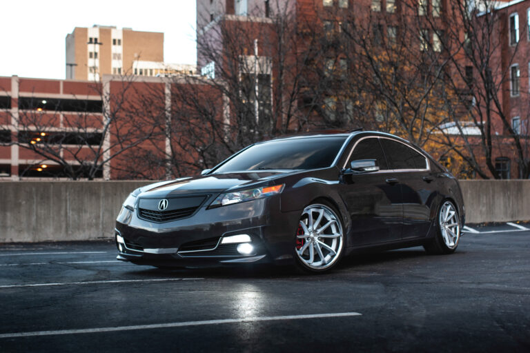 A 2012 Acura TL on Blaque Diamond BD-23 Machined Silver with Chrome Lip Wheels