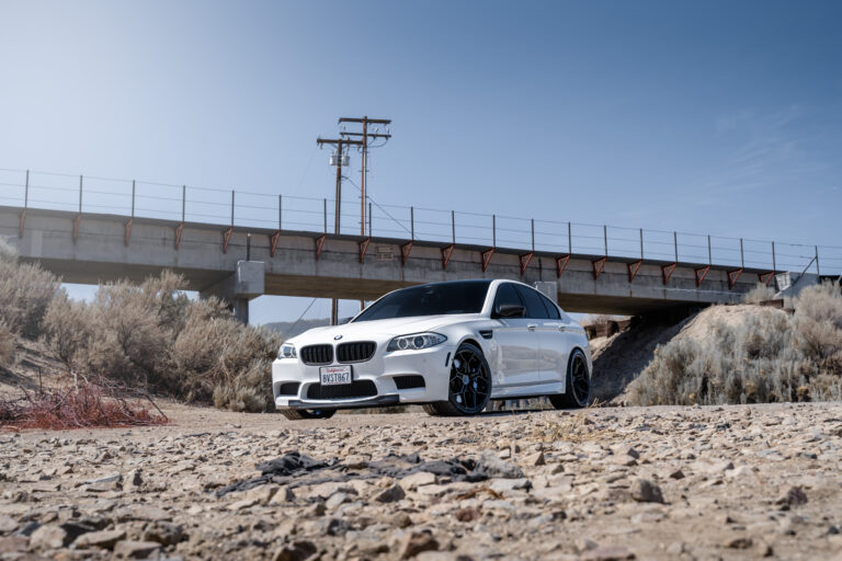 A 2013 BMW M5 on 20 Inch BD-F25 Gloss Black Wheels