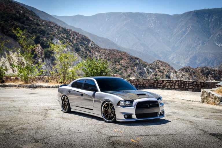 A 2014 Dodge Charger on 22 Inch Blaque Diamond BD-23 Bronze with SS Lip Wheels