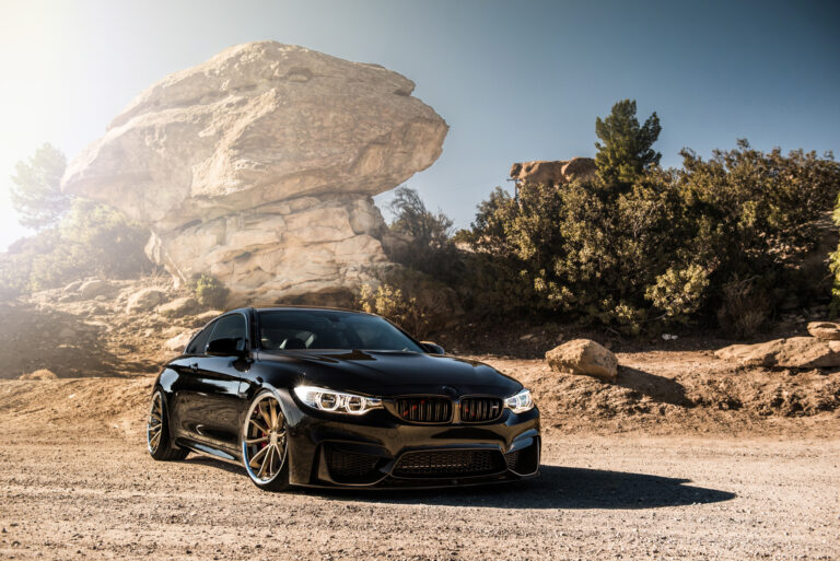 A 2015 BMW M4 on Staggered Blaque Diamond BD-23 Matte Bronze Wheels