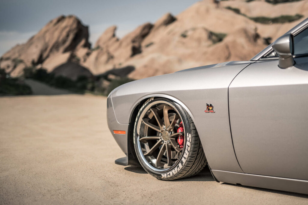 A 2015 Dodge Challenger Scat Pack on Blaque Diamond BD-23 Bronze Chrome with SS Lip Wheels