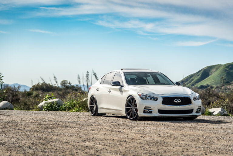 A 2015 Infiniti Q50 on 20 Inch Blaque Diamond BD-11 Matte Antique Bronze Wheels