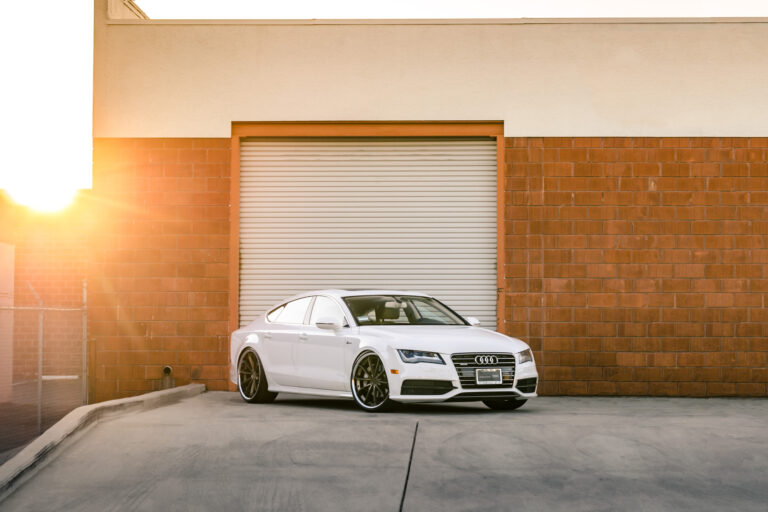 A White 2016 Audi A7 on 20 Inch Blaque Diamond BD-23 Bronze with Chrome SS Lip Wheels