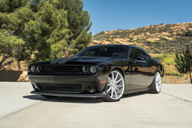 A 2016 Dodge Charger SRT on 22 Inch Blaque Diamond BD-11 Frozen Silver Wheels