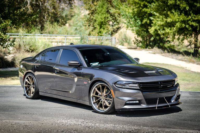 A 2016 Dodge Charger RT on 22 Inch Blaque Diamond BD-23 Bronze with SS Lip Wheels