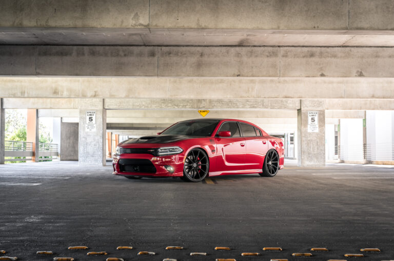 A 2016 Dodge Charger SRT on Blaque Diamond BD-11 Gloss Black Wheels