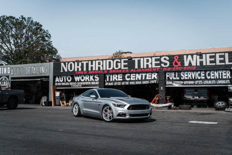 A 2016 Ford Mustang GT on 20 Inch Blaque Diamond BD-F25 Brushed Silver Wheels