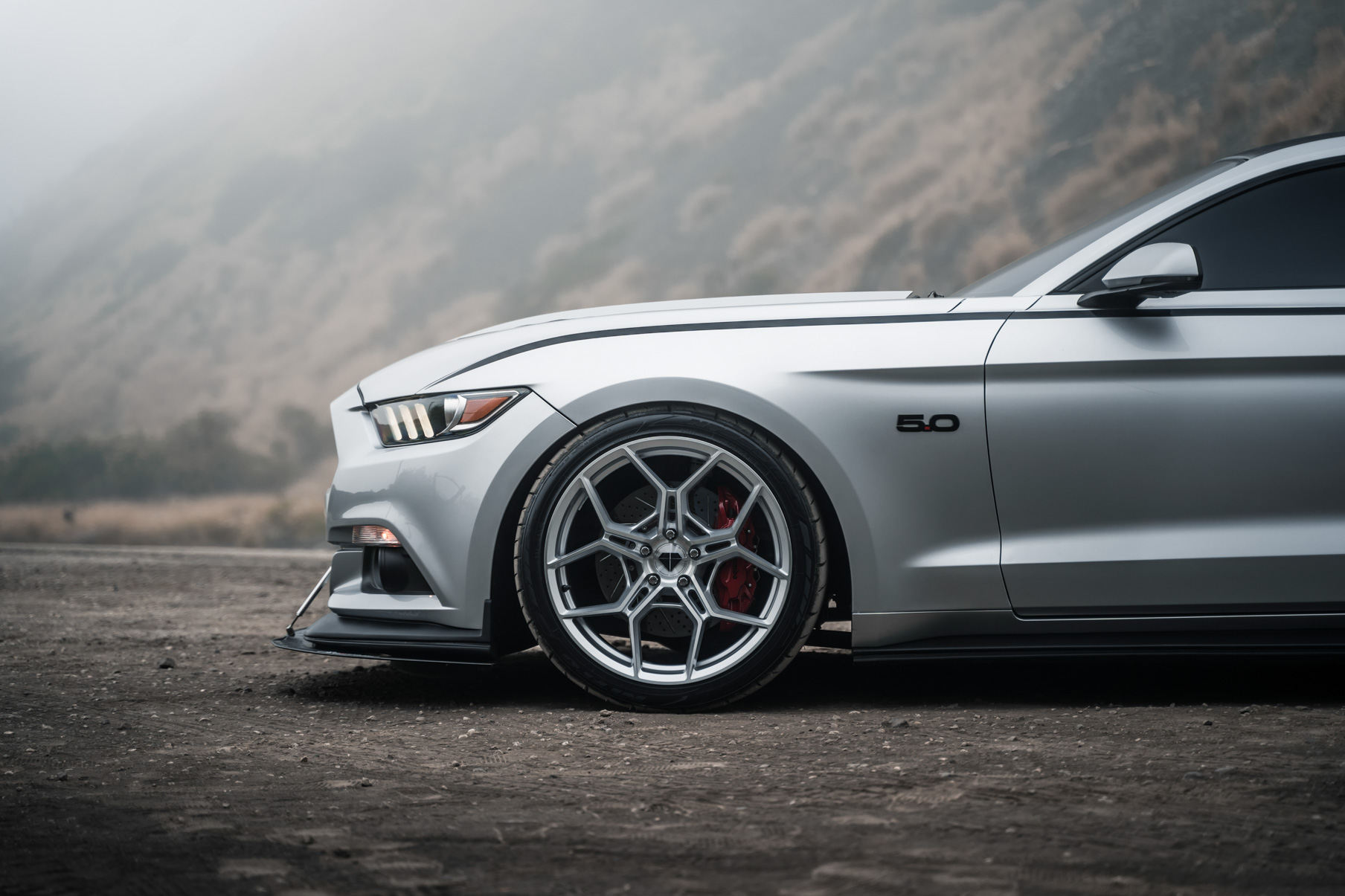 A 2016 Ford Mustang GT on 20 Inch Blaque Diamond BD-F25 Brushed Silver Wheels