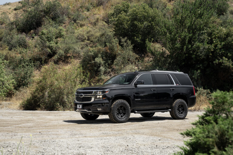 A 2017 Chevrolet Tahoe on 18 Inch Blaque Diamond BD-0801 Textured Black Wheels