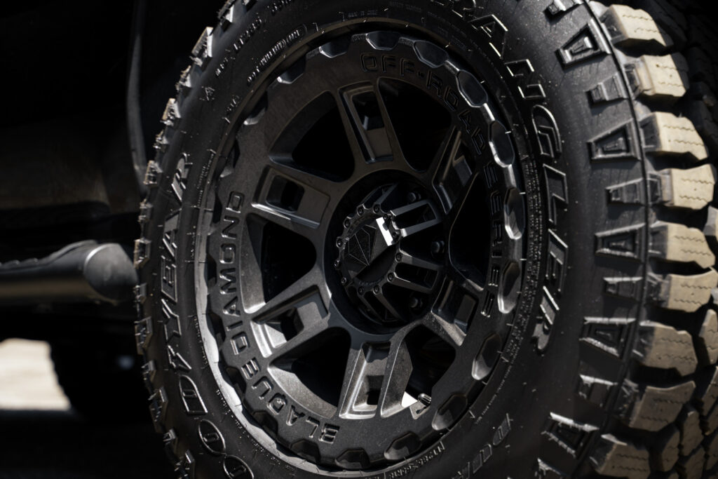 A 2017 Chevrolet Tahoe on 18 Inch Blaque Diamond BD-0801 Textured Black Wheels