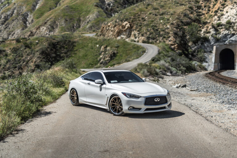 A White 2017 Infiniti Q60 on BD-23 20 Inch Bronze Chrome SS Lip Staggered Wheels