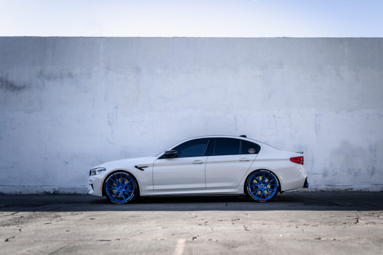 A 2018 BMW M5 on 20 Inch Blaque Diamond BD-F18 Brushed Blue Wheels