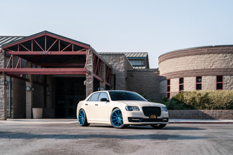 A 2018 Chrysler 300 on 22 Inch Blaque Diamond BD-11 Brushed Blue Wheels