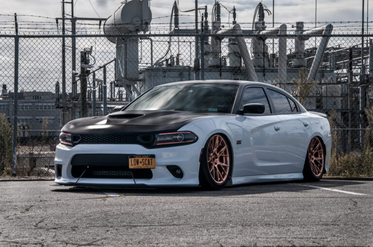 A 2018 Dodge Charger on 20 Inch Blaque Diamond BD-F18 Custom Polished Rose Gold Wheels