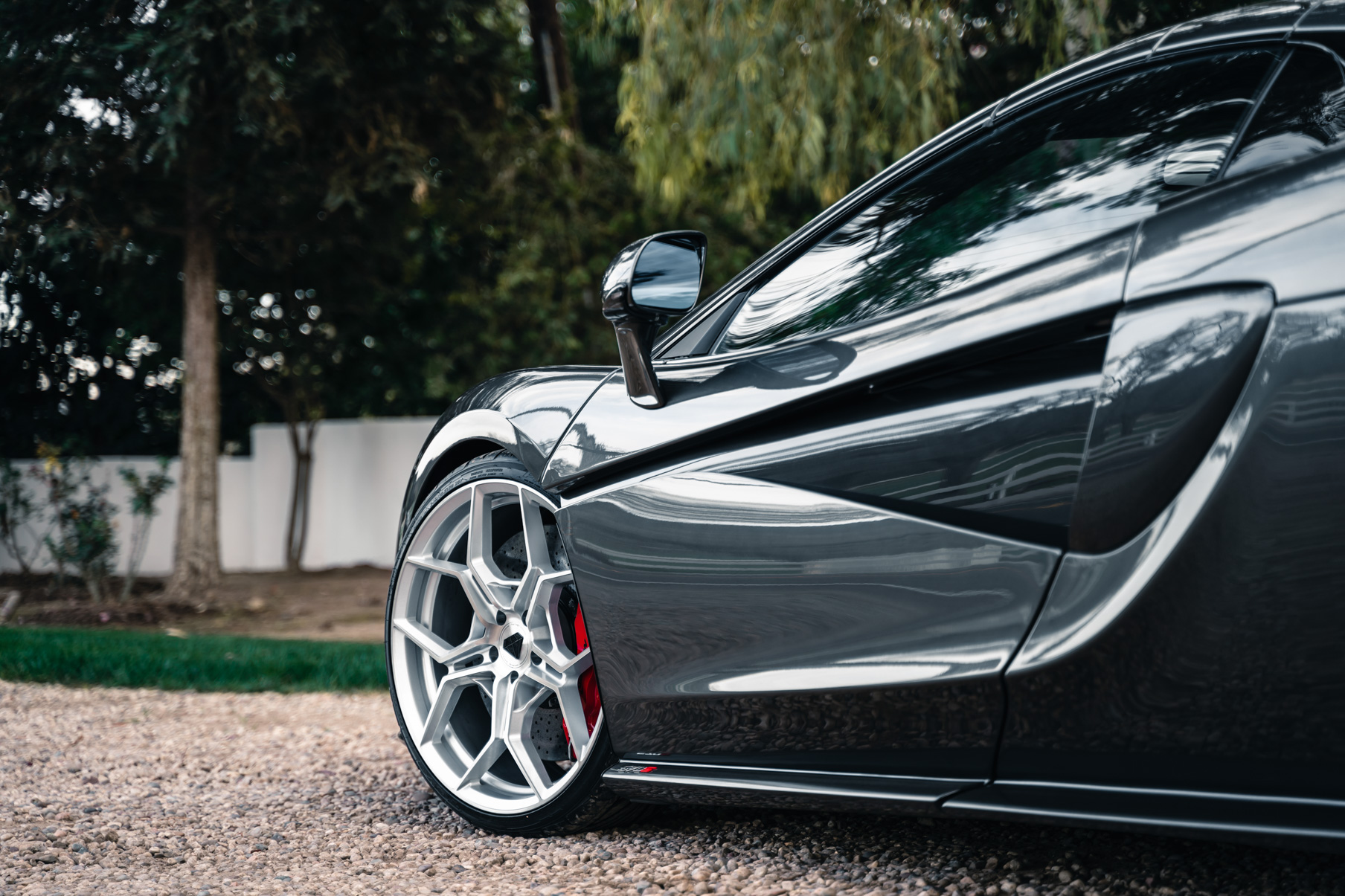 A 2019 McLaren 570s on 20 Inch Blaque Diamond BD-F25 Brushed Silver Wheels