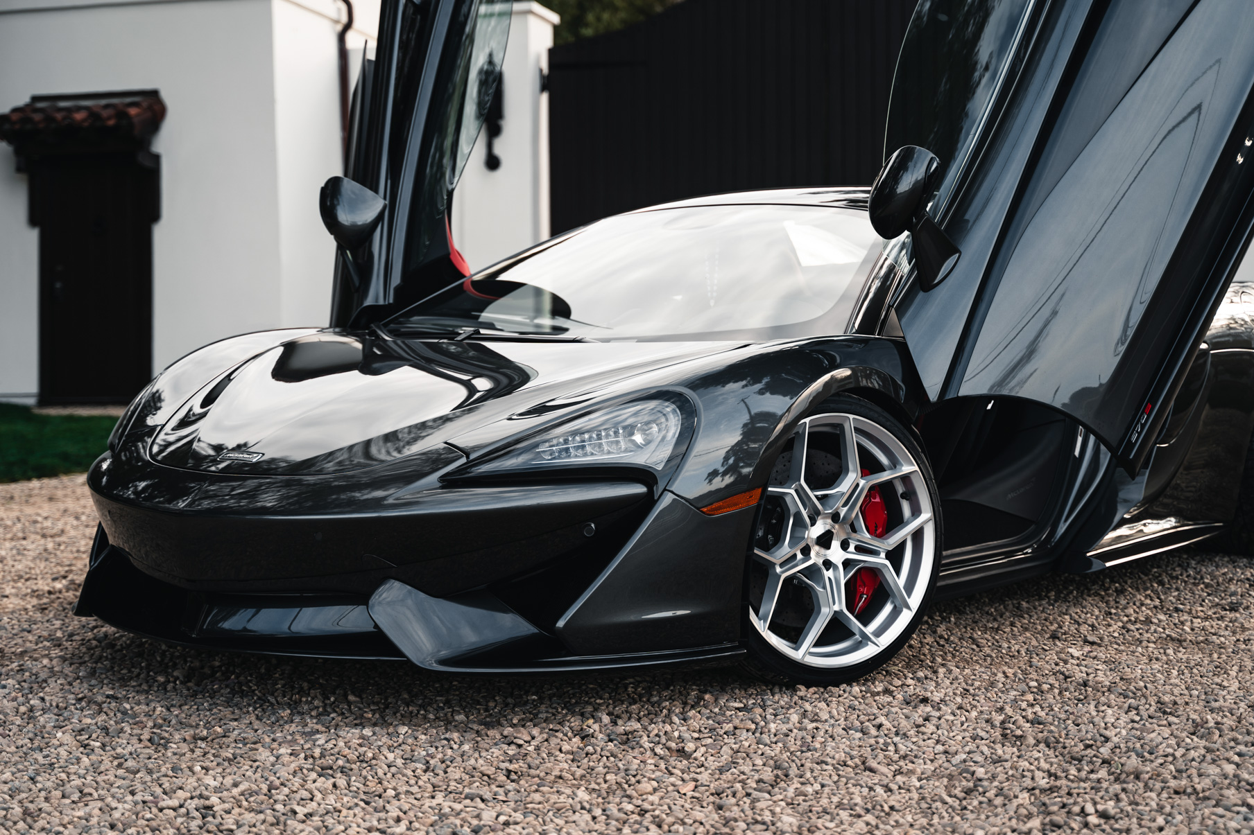 A 2019 McLaren 570s on 20 Inch Blaque Diamond BD-F25 Brushed Silver Wheels